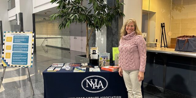 Friday April at NYLA registration desk – April Bliss